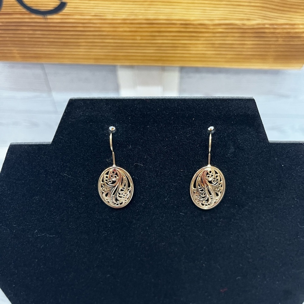 Intricate Gold Tone Oval Earrings